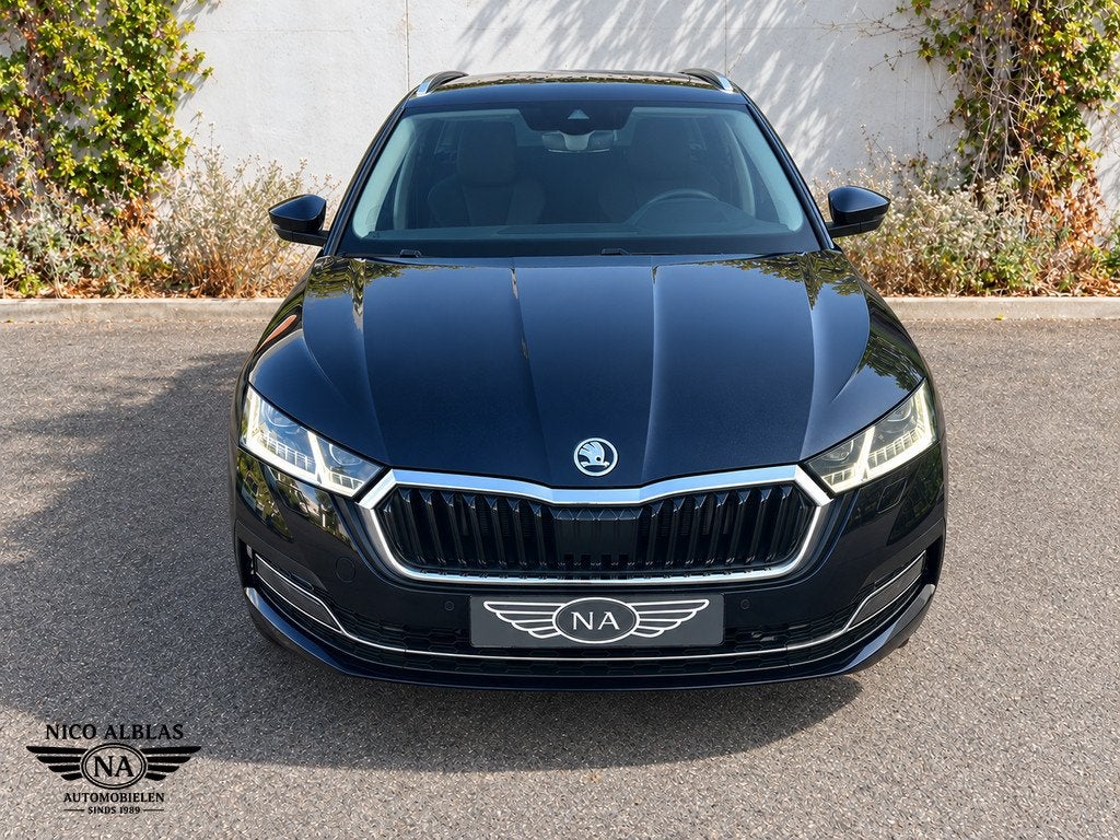 Skoda Octavia Combi 1.4 TSI iV PHEV Business Edition Plus, Auto's, Dealer onderhouden, Gebruikt, Zwart, Plug-in hybride