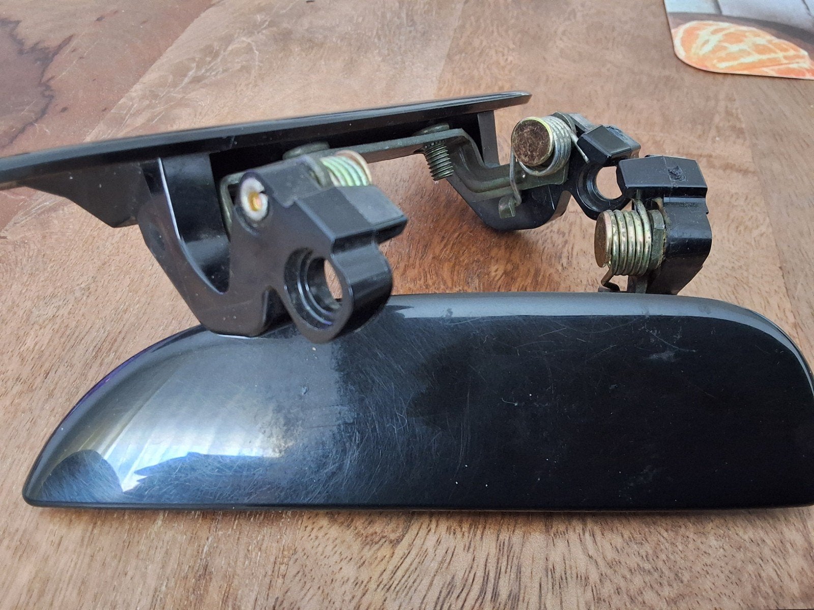 Deurklink Buitenkant Zwart - Gebruikt  Daihatsu Cuore 2004, Auto-onderdelen, Carrosserie en Plaatwerk, Ophalen of Verzenden, Gebruikt
