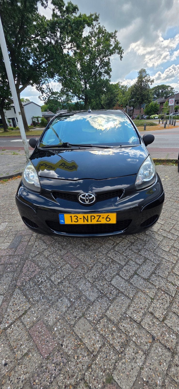 Toyota Aygo 1.0 12V Vvt-i 5DRS 2010 Zwart, Auto's, Voorwielaandrijving, Stof, Airbags, 4 stoelen
