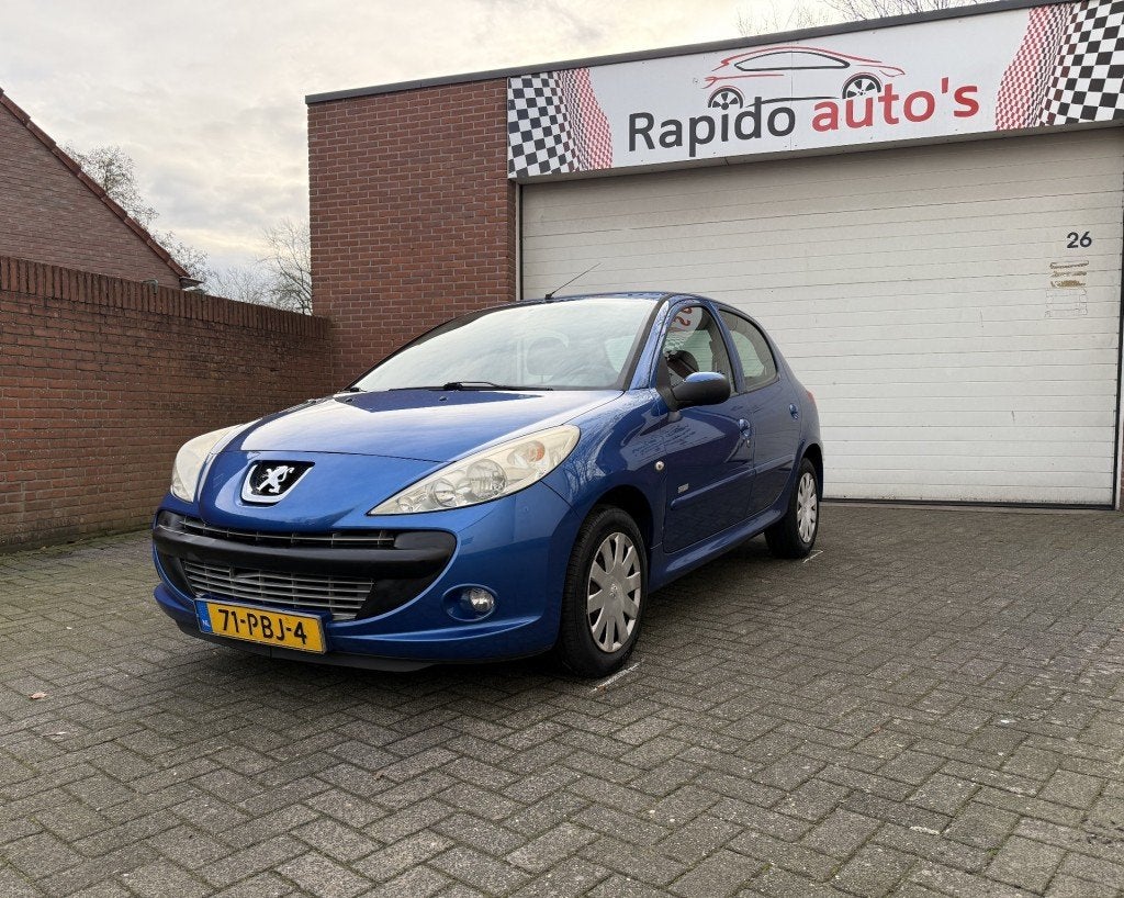 Peugeot 206+ 1.4 MILLESIM 200  AIRCO Nieuwe APK NAP, Auto's, Peugeot, 31 €/maand, 4 cilinders, Blauw, Origineel Nederlands
