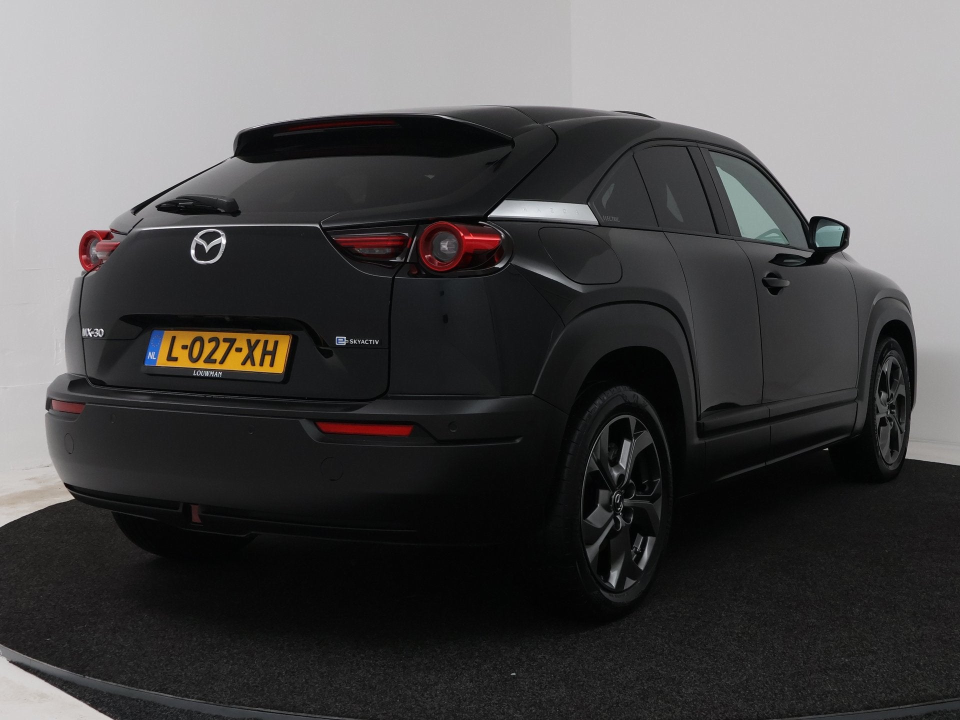 Mazda MX-30 e-SkyActiv 145 Luxury 36 kWh | Schuifdak | BOSE, Gebruikt, Leder en Stof, Zwart, Origineel Nederlands