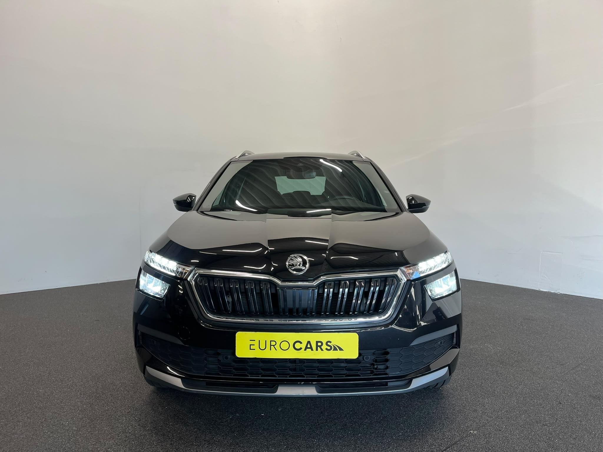 Skoda Kamiq 1.0 TSI DSG Clever Panoramadak Trekhaak Navigati, Stof, Gebruikt, Euro 6, Zwart