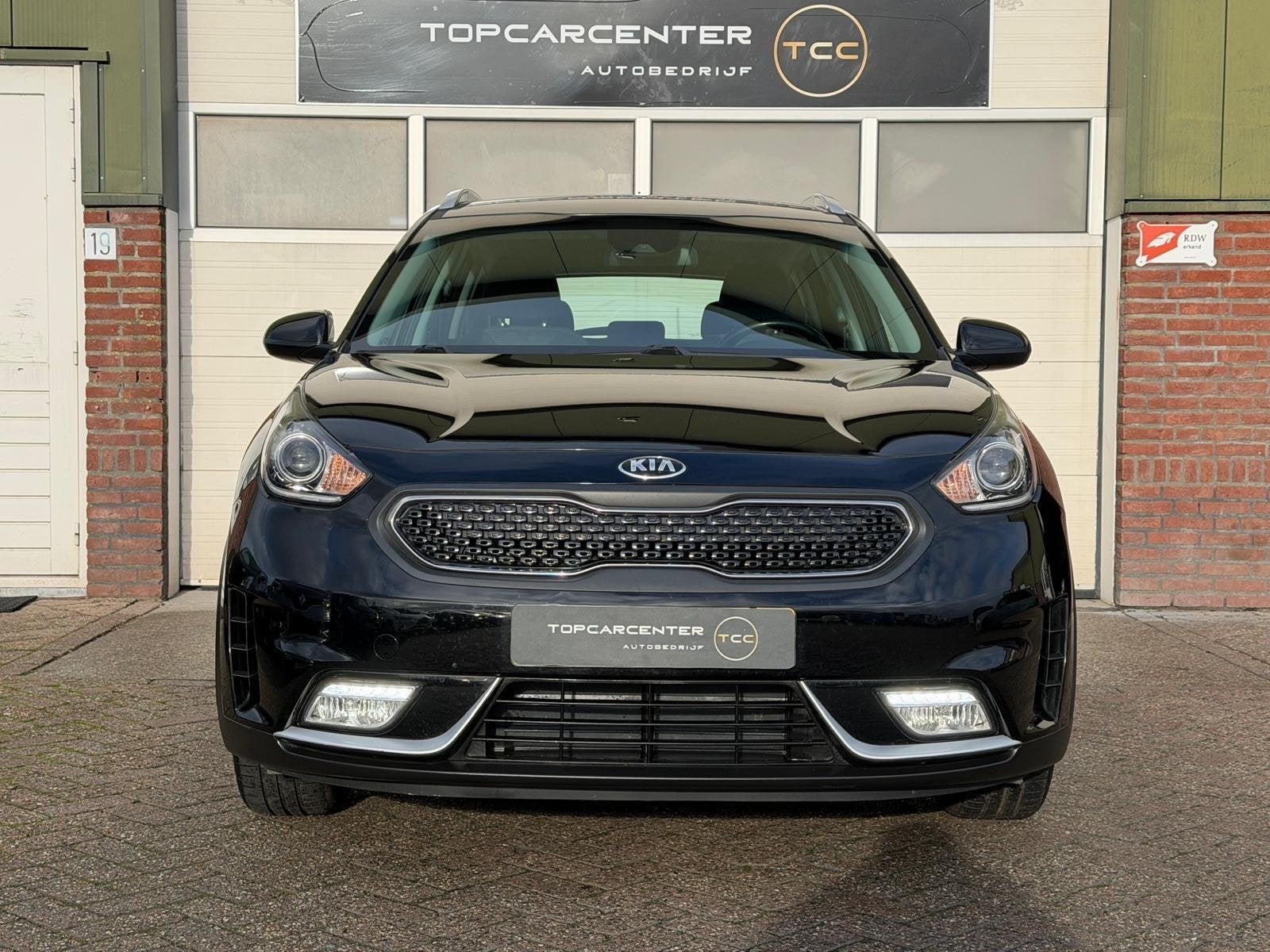 Kia Niro 1.6 GDi Hybrid ComfortLine/AIRCO/AUT/TREKH/APK/NAP, Auto's, Euro 6, Zwart, Origineel Nederlands, 26 km/l