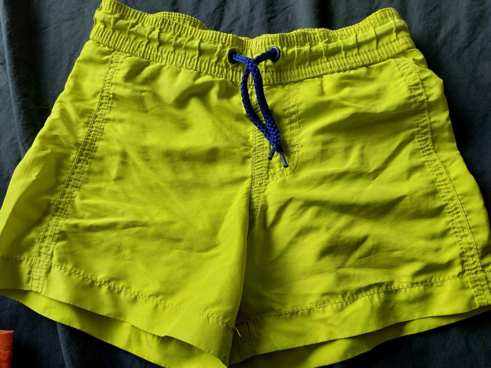 Neon gele zwembroek maat 98/104, Gebruikt, Maat 98, Ophalen of Verzenden, HEMA