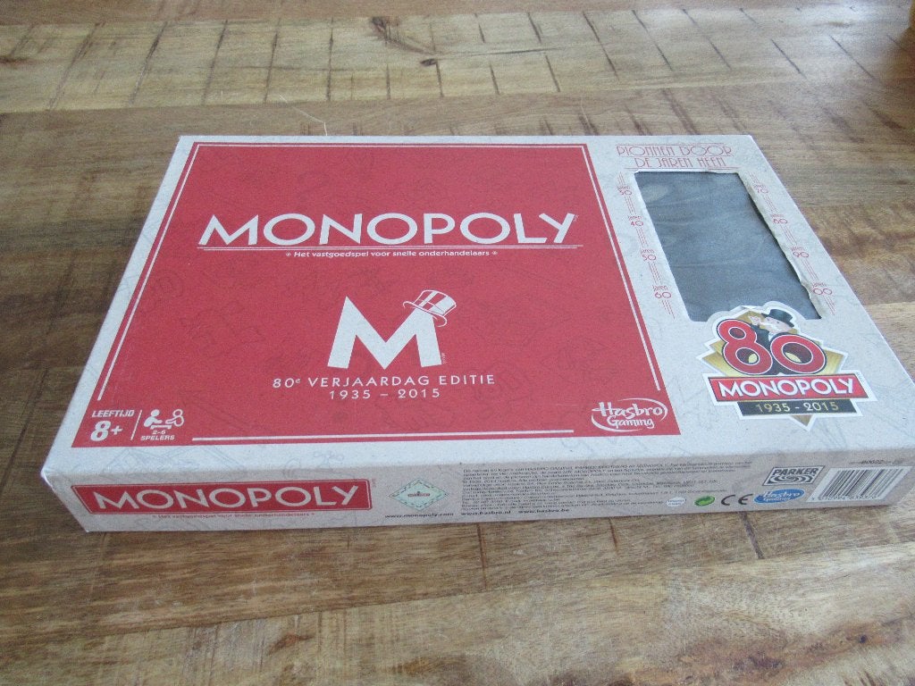 Monopoly spel 80 jaar verjaardag editie Als nieuw. 1935-2015, Ophalen of Verzenden, Zo goed als nieuw