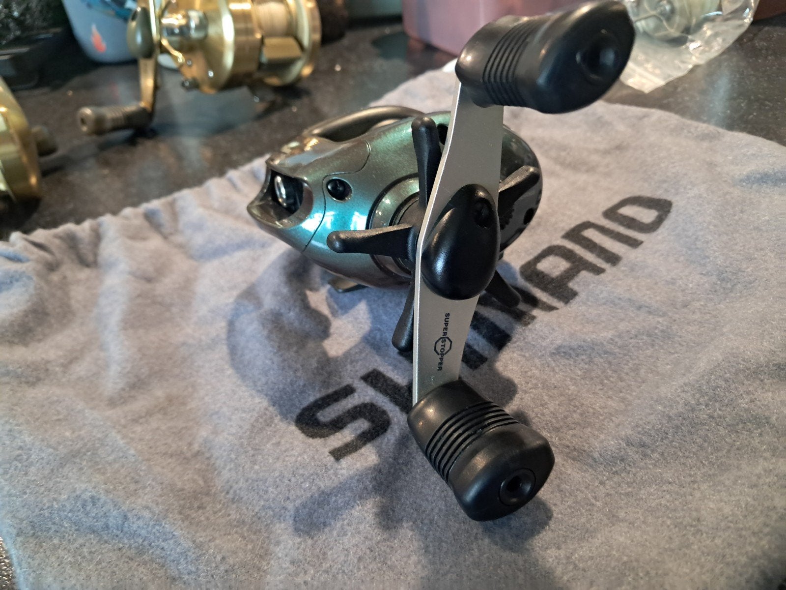 shimano bantam casting reel + als nieuw + reserve spoel., Ophalen of Verzenden, Zo goed als nieuw, Molen
