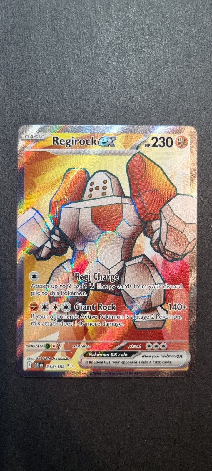 Regirock ex DRI 214, Ophalen of Verzenden, Zo goed als nieuw, Losse kaart, Foil