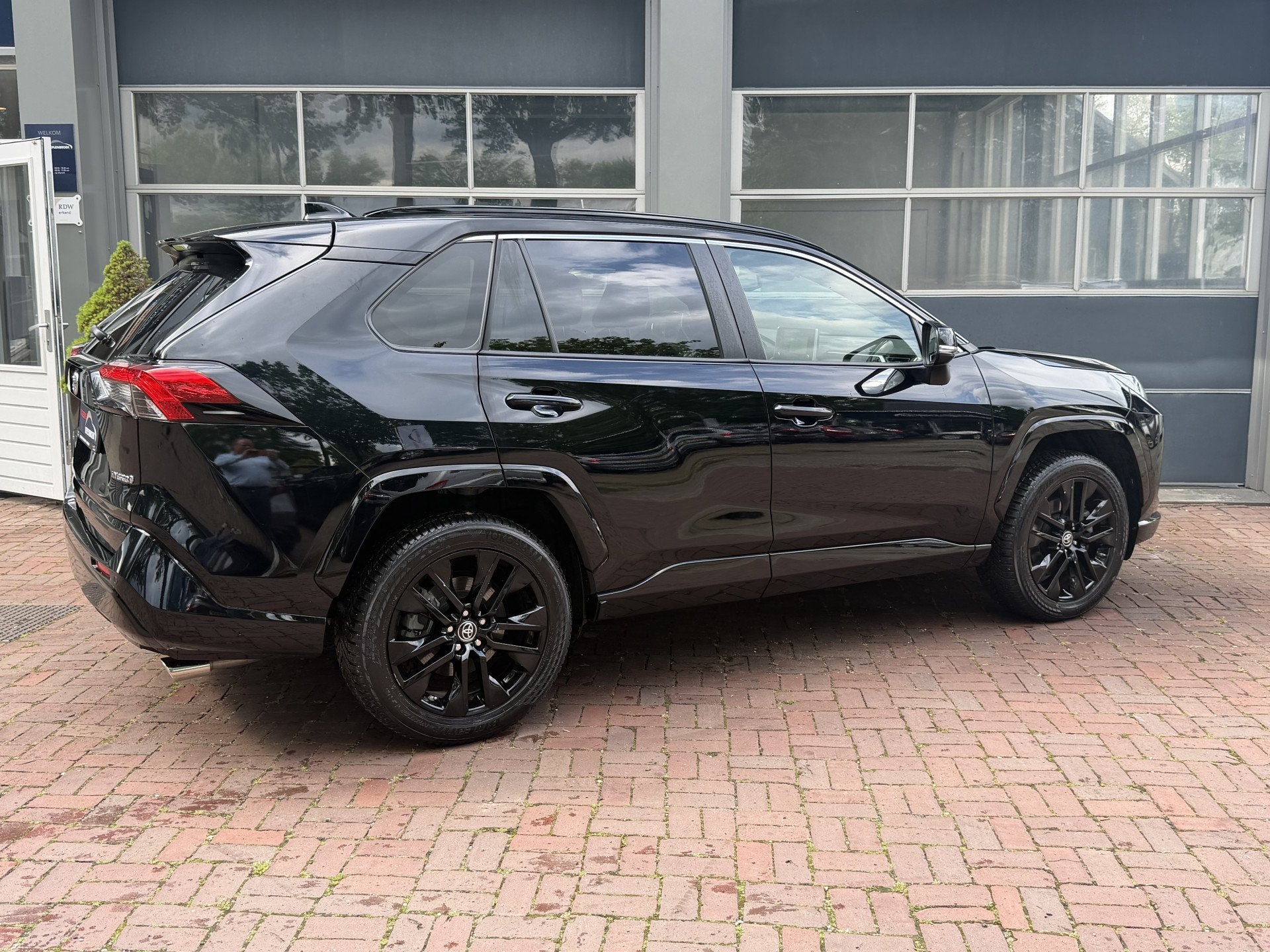 Toyota RAV4 2.5 Hybrid Black Edition | LED | Navi | JBL | AC, Automaat, Gebruikt, 2487 cc, Leder en Stof