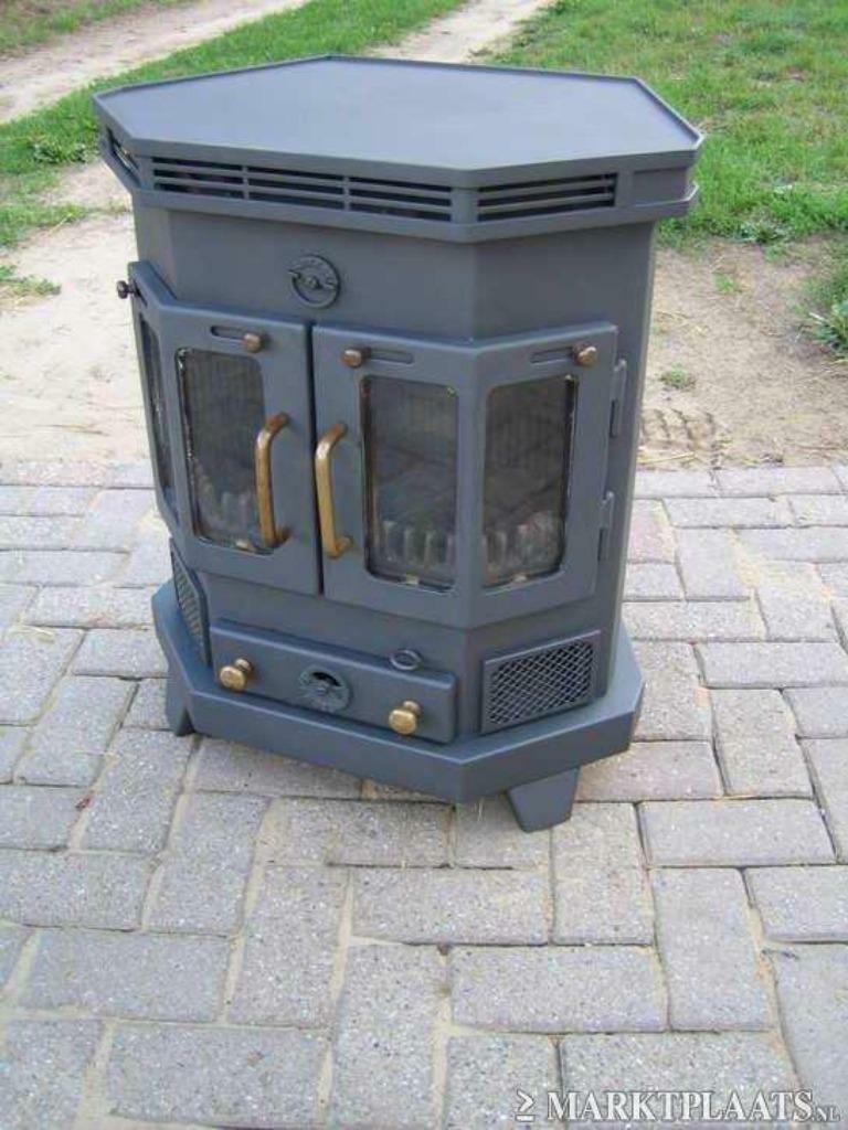 gebruikte BARBAS ROSOLO houtkachel vermogen 9 kw