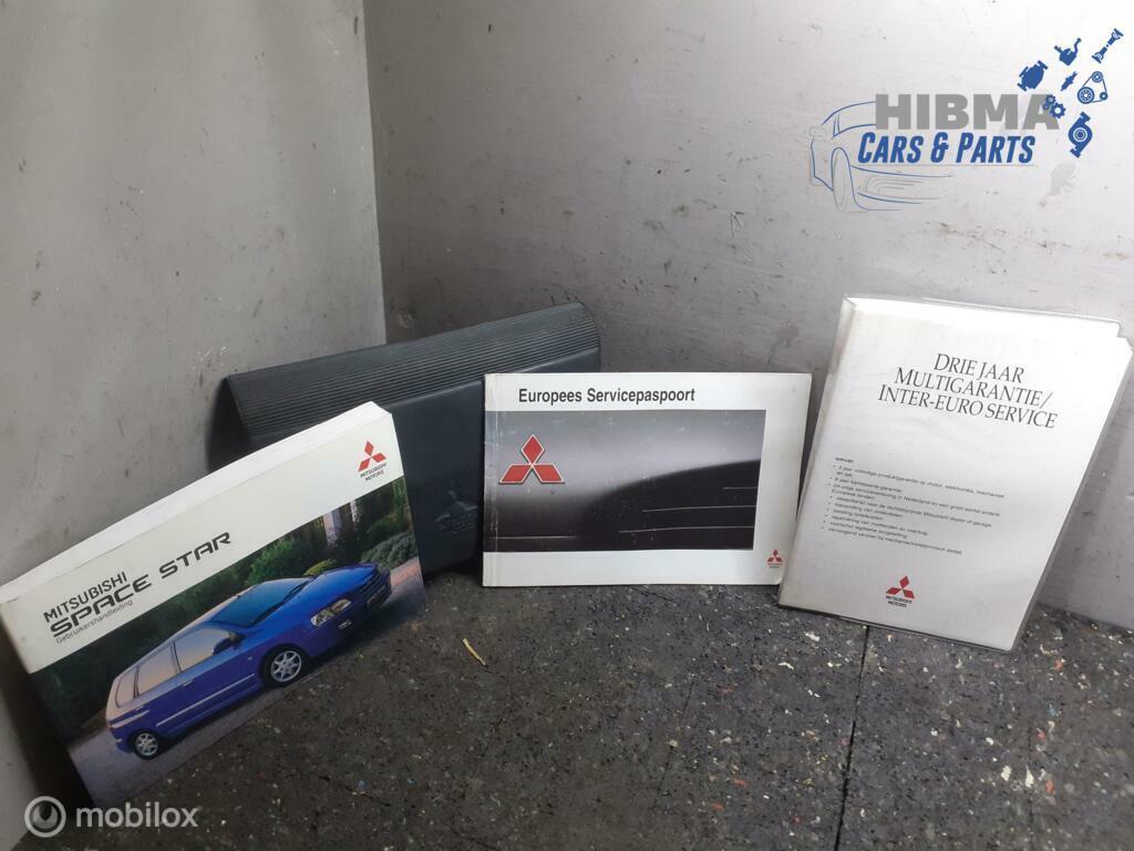 Instructieboekje Mitsubishi Spacestar 1998 t/m 2005, Ophalen of Verzenden, Gebruikt