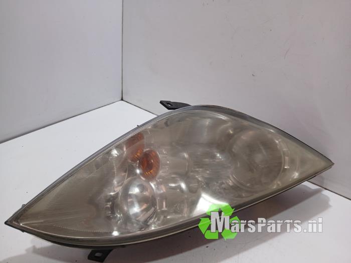 Koplamp rechts van een Mitsubishi Colt