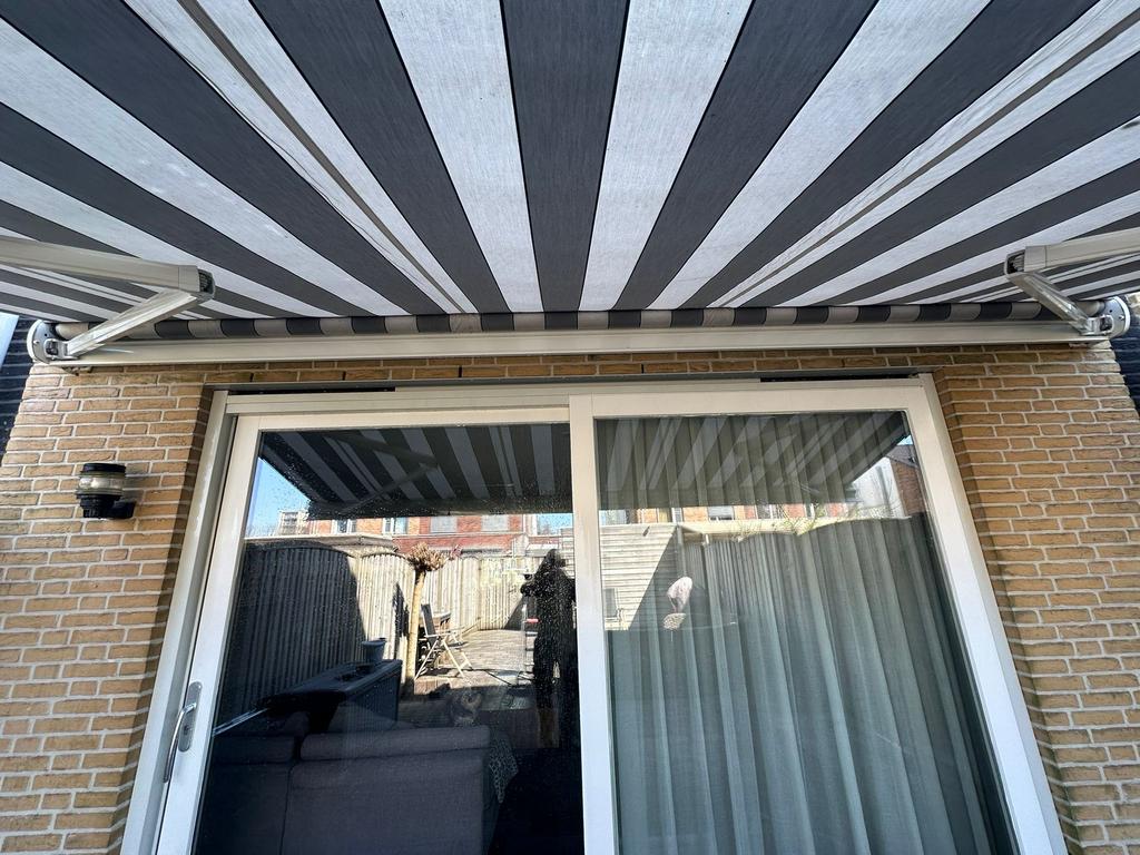 Knikarmscherm ronde cassette 5x3 meter, Tuin en Terras, Zonneschermen, Ophalen, Gebruikt, 450 cm of meer, Knikarmscherm