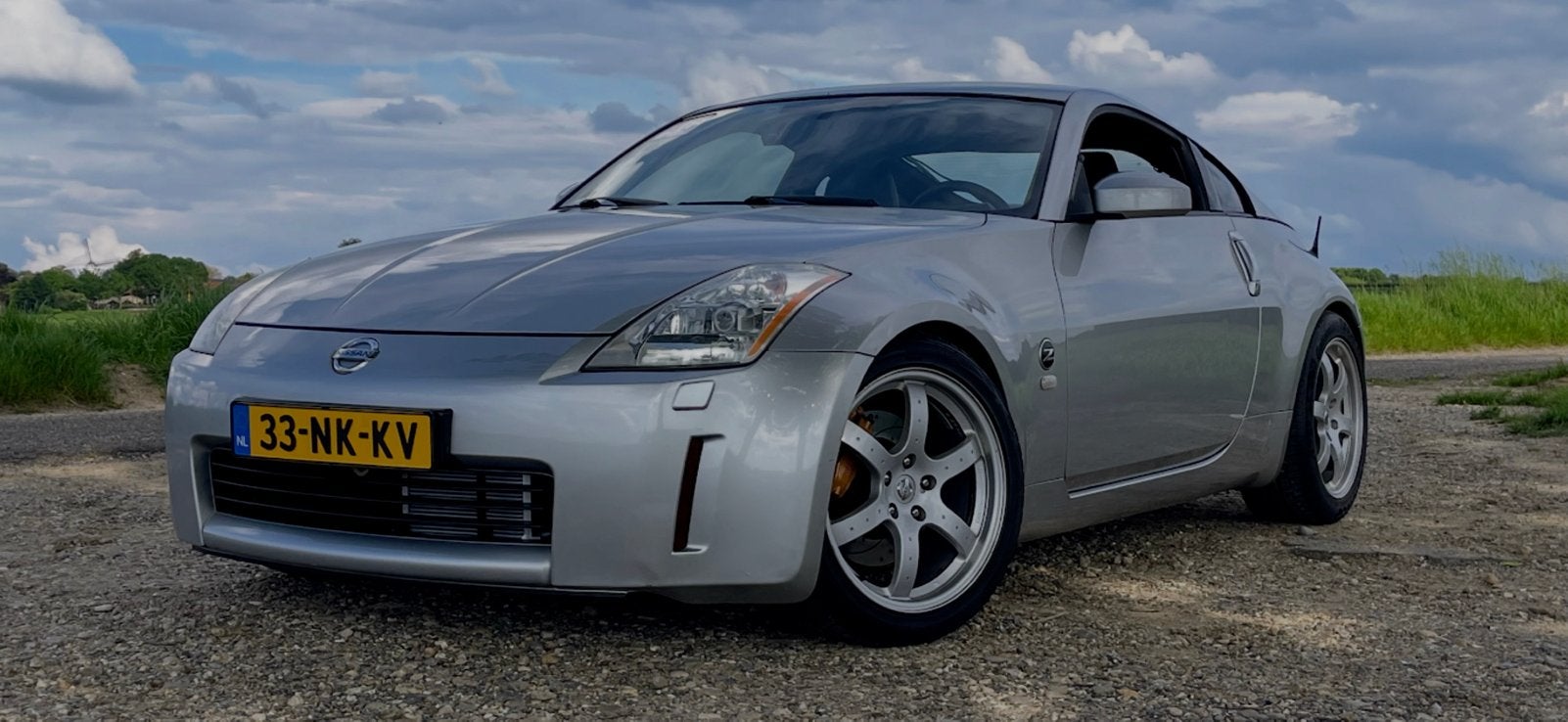 Nissan 350Z 3.5 V6 24V 2003 Grijs, Auto's, Nissan, 350Z, Achterwielaandrijving, Zwart, Leder en Stof