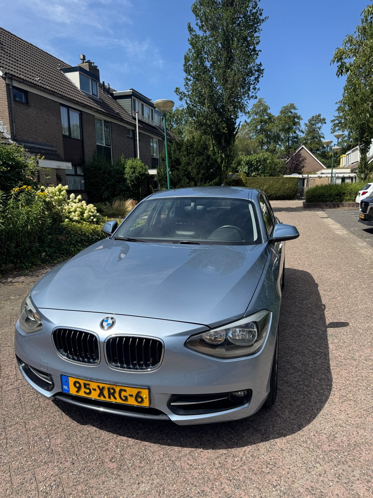 BMW 1-Serie 116I 100KW 5DR 2012, Auto's, BMW, 1-Serie, Zwart, 4 cilinders, Blauw