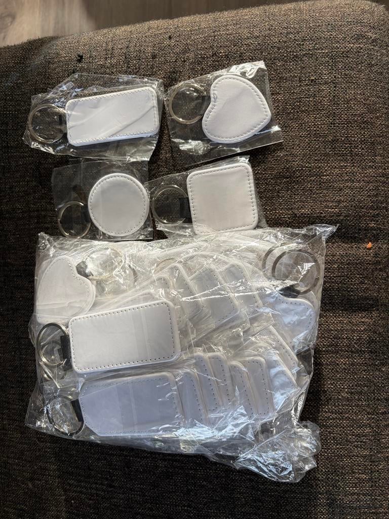 50 stuks Sublimatie sleutelhangers - Diverse vormen, Ophalen of Verzenden, Nieuw, Overige typen