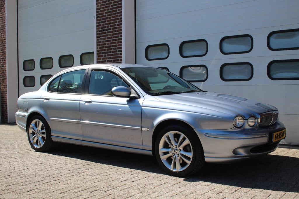 Jaguar X-type 2.5 V6 Automaat * Nap / Clima / Navi *, Auto's, Automaat, Gebruikt, 1595 kg, Blauw