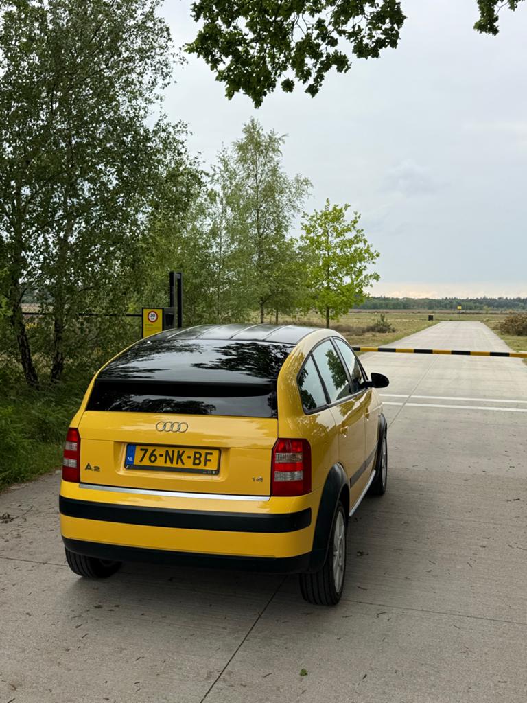 Audi A2 1.4 55KW 2003 Geel Color Storm, Auto's, Audi, Stof, 74 pk, 31 €/maand, 4 cilinders