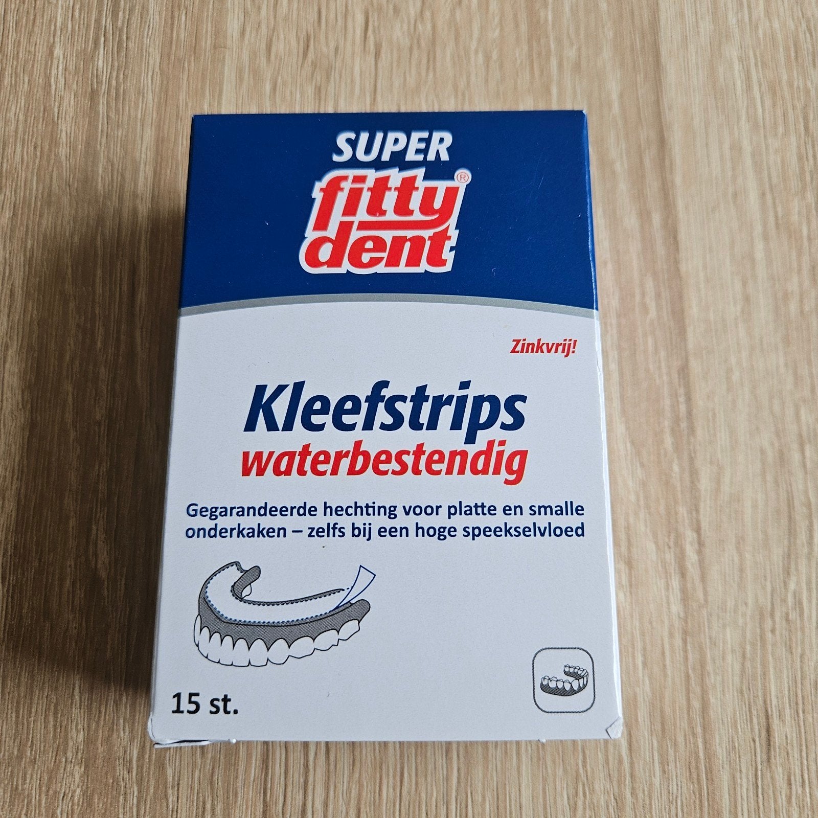 Kleef strips voor kunst gebit, Ophalen