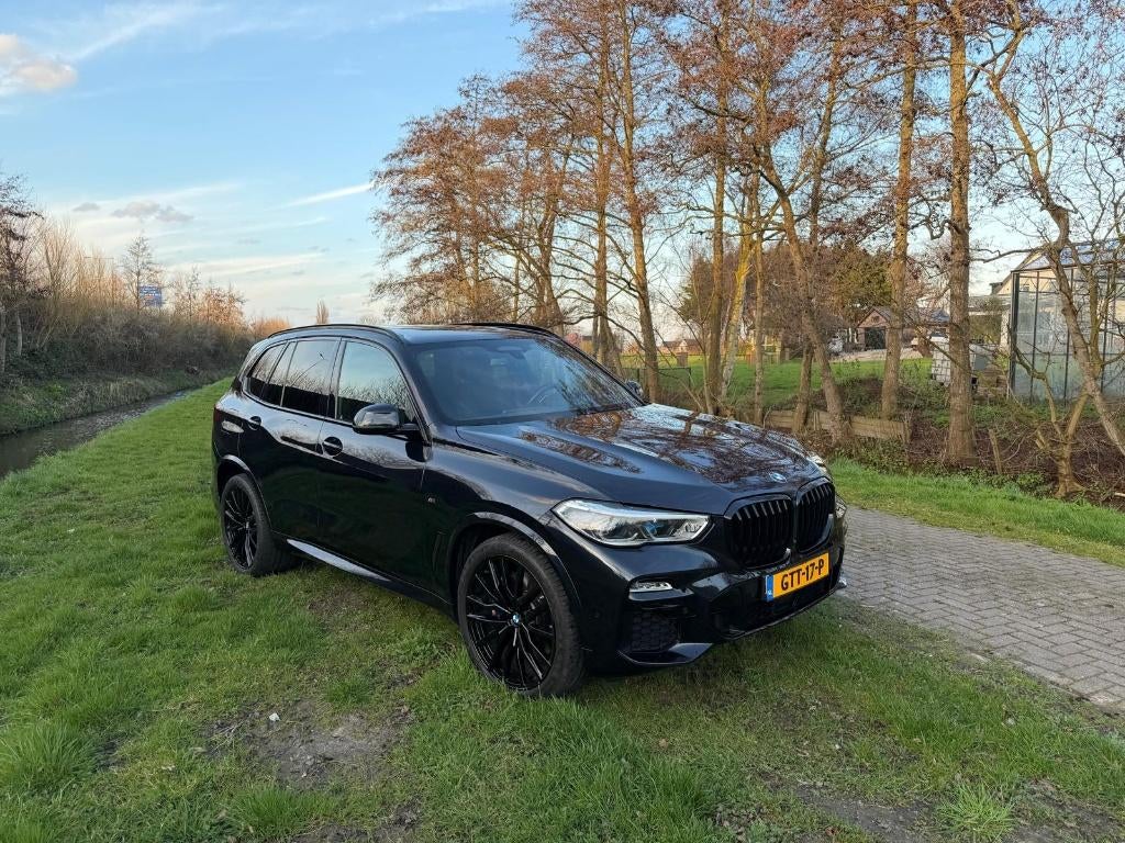 BMW X5 45e M Executive Laser 360 Harman 22” Alarm5 AVILOO96%, Auto's, BMW, Automaat, 394 pk, Parkeerassistent, Zwart