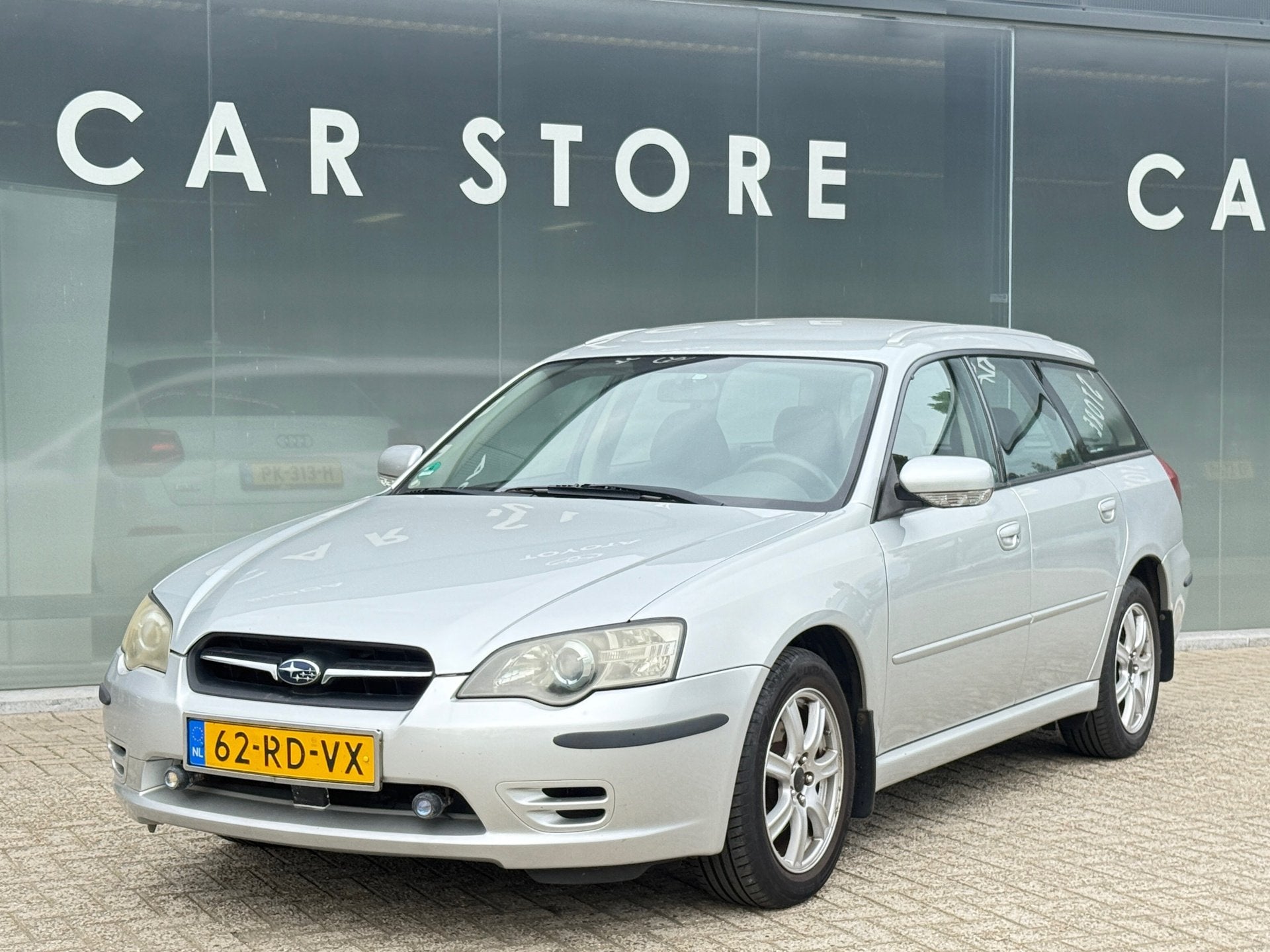 Subaru Legacy Touring Wagon 2.0i Dealer Onderhouden TOP STAA, Auto's, Dealer onderhouden, Gebruikt, Zwart, 4 cilinders