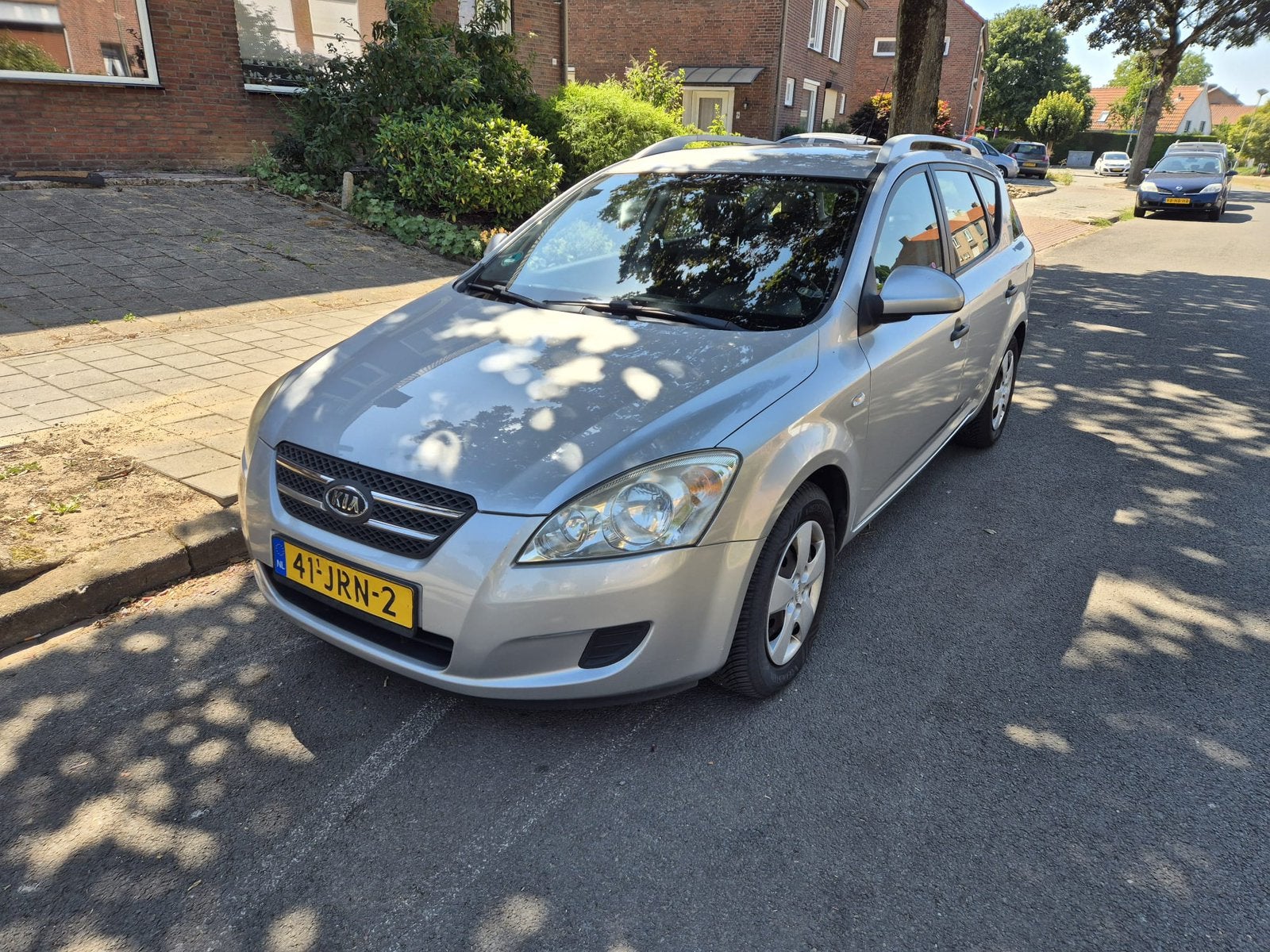 Kia (Pro) Cee d 1.4 Sporty Wagon 2009 Grijs, Auto's, Voorwielaandrijving, Stof, Zwart, 4 cilinders