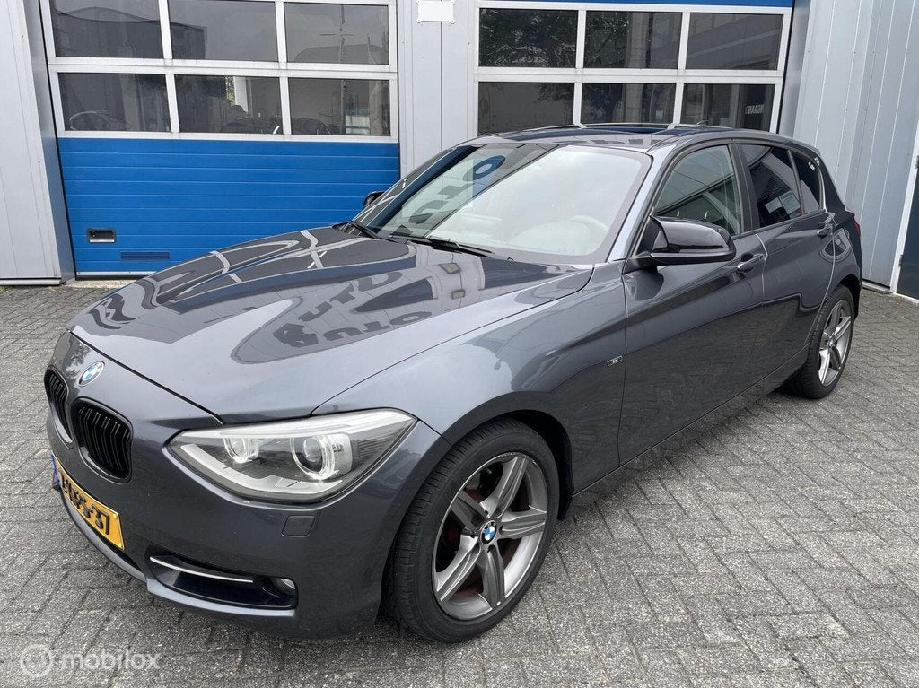 BMW 1-serie 114i 5D Sport Edition Leer-17''-Xenon-dakje-17'', Auto's, BMW, Bedrijf, Te koop, 1-Serie, ABS, Achteruitrijcamera