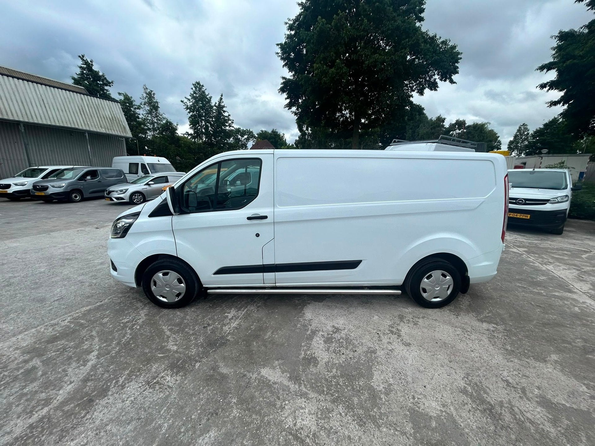 Ford Transit Custom 300 2.0 TDCI L2H1 euro 6, Auto's, Voorwielaandrijving, Dealer onderhouden, Stof, Euro 6