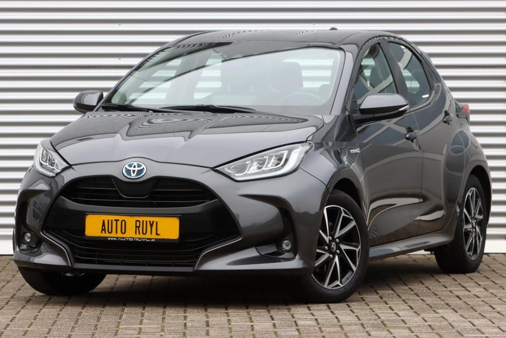 Toyota Yaris 1.5 Hybrid Dynamic Carplay / Camera / Stoel ver, Auto's, Stof, Gebruikt, Zwart, Bedrijf