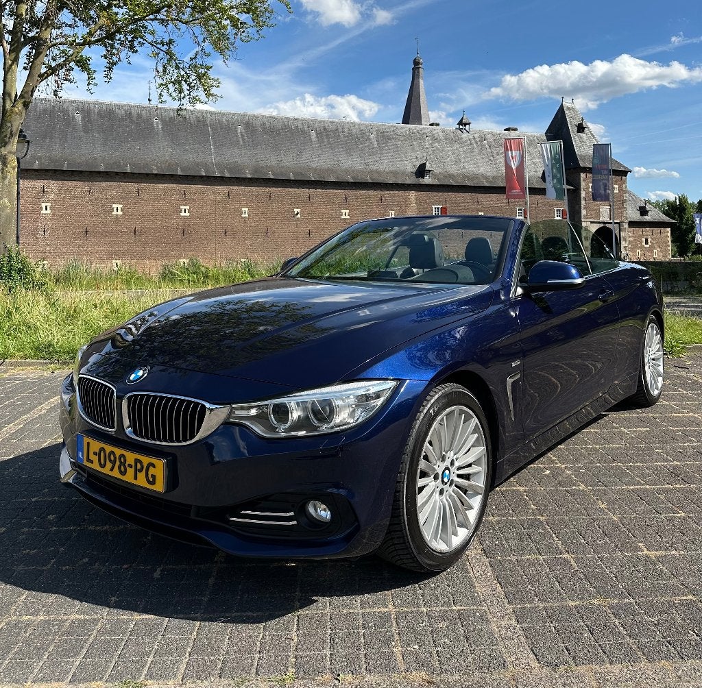 BMW 4-Serie 428i Luxury Cabrio 245pk 2014 Tanzanit Blauw, Auto's, BMW, Euro 5, Zwart, Cabriolet, Handgeschakeld