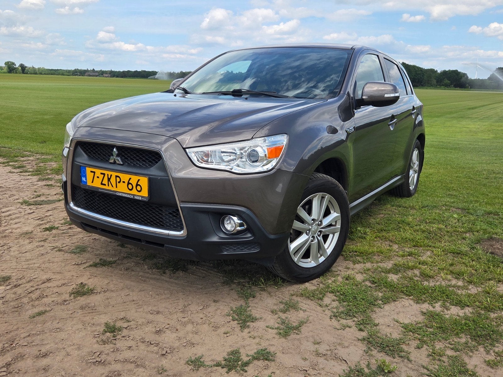 Mitsubishi ASX 1.6 86KW 2010 Bruin, Auto's, Mitsubishi, Voorwielaandrijving, Stof, Zwart, 4 cilinders
