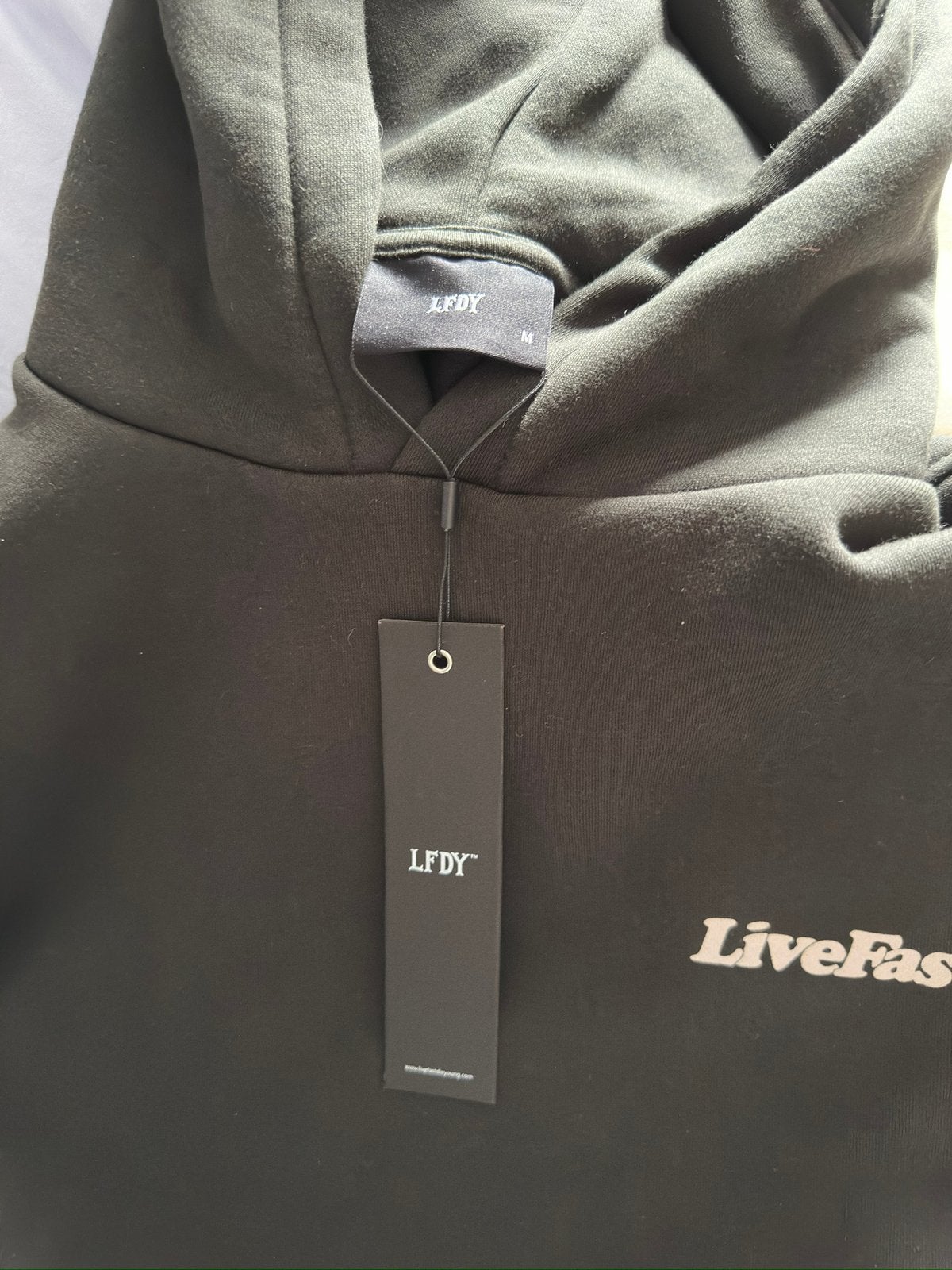 LFDY Hoodie Zwart - maat L - met prijskaartje, Ophalen of Verzenden, Zo goed als nieuw, Maat 52/54 (L), Zwart