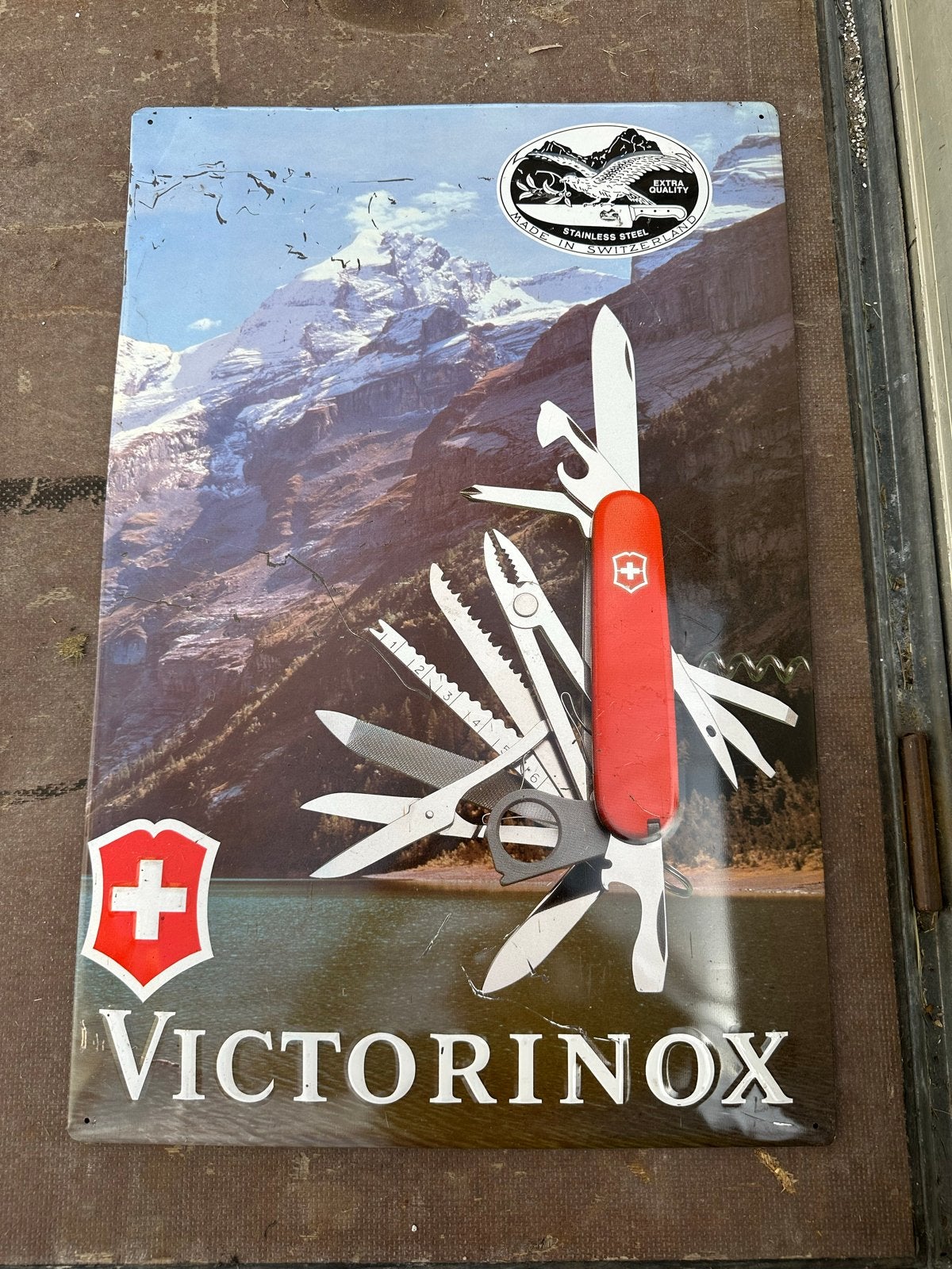 Victorinox Zwitsers Zakmes Emaille Reclamebord, Ophalen