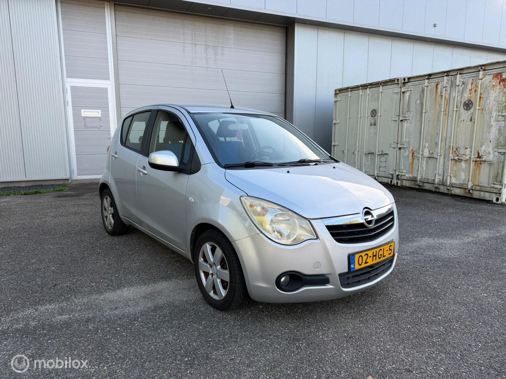 Opel Agila 1.0 Enjoy Airco / 2x sleutel + boekjes / NAP, Auto's, Gebruikt, 31 €/maand, Verwarmde buitenspiegels, 996 cc