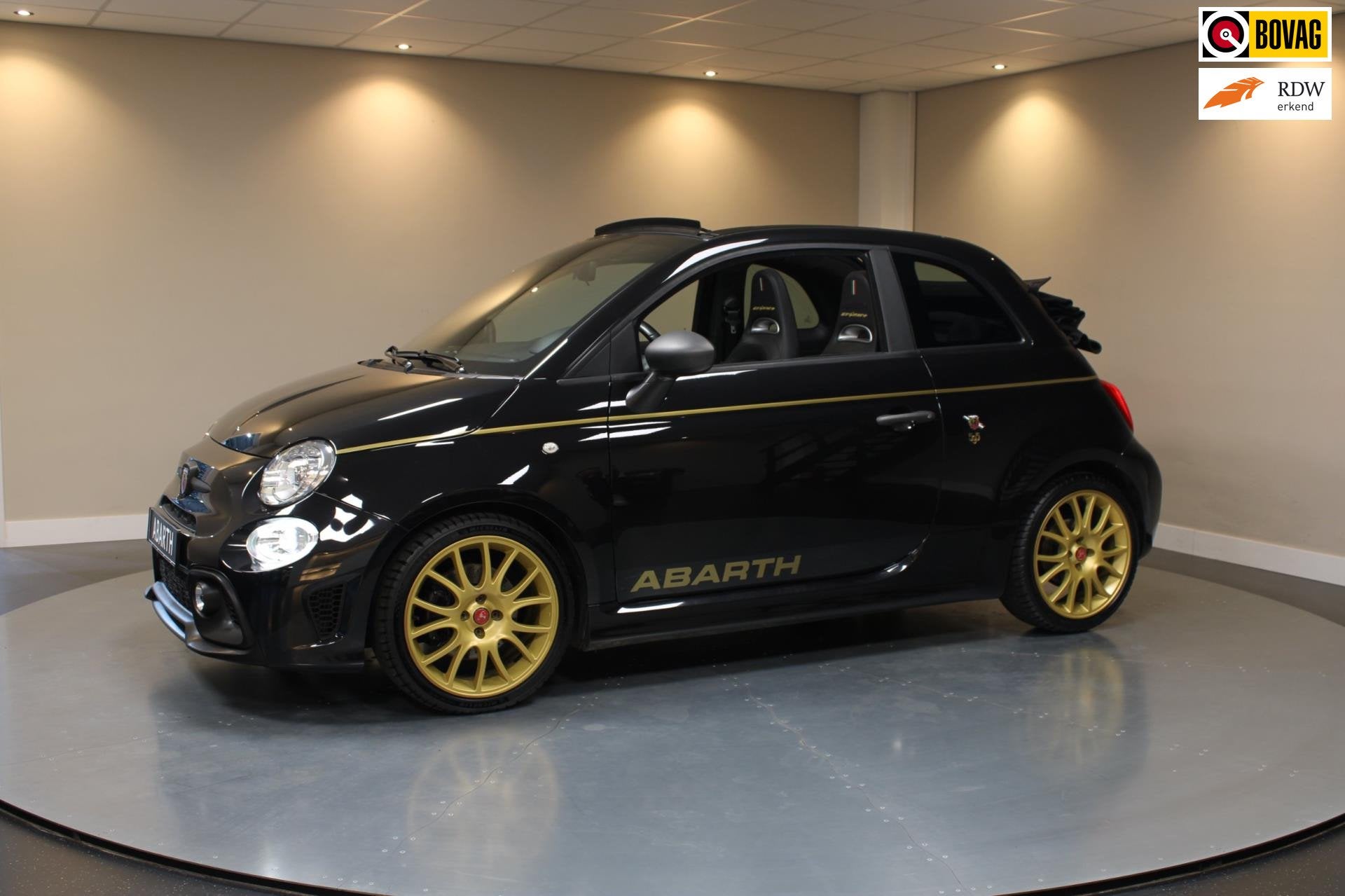 Abarth 595 C 1.4 Turbo Scorpioneoro *1/2000 Limited Edition*, Auto's, Dealer onderhouden, Gebruikt, Zwart, Cabriolet