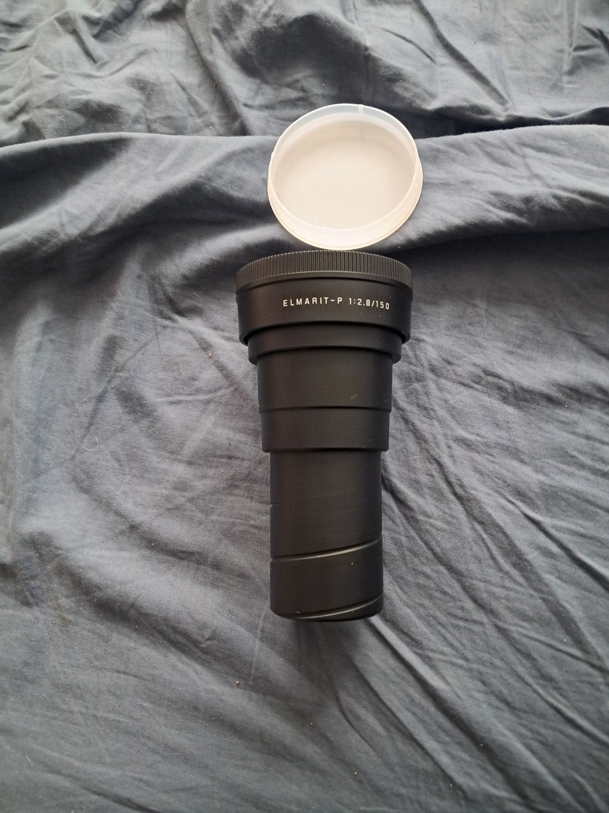 Leica Leitz Elmarit-P 150mm f/2.8 – NIEUW in originele koker, Ophalen of Verzenden, 1960 tot 1980, Lens of Lenzen