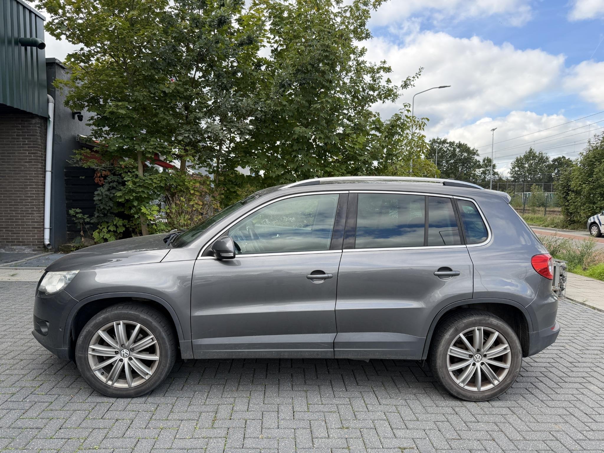 Volkswagen Tiguan 1.4 TSI Sport&Style | Trekhaak | PDC | Mee, Auto's, Voorwielaandrijving, Euro 5, Zwart, 4 cilinders