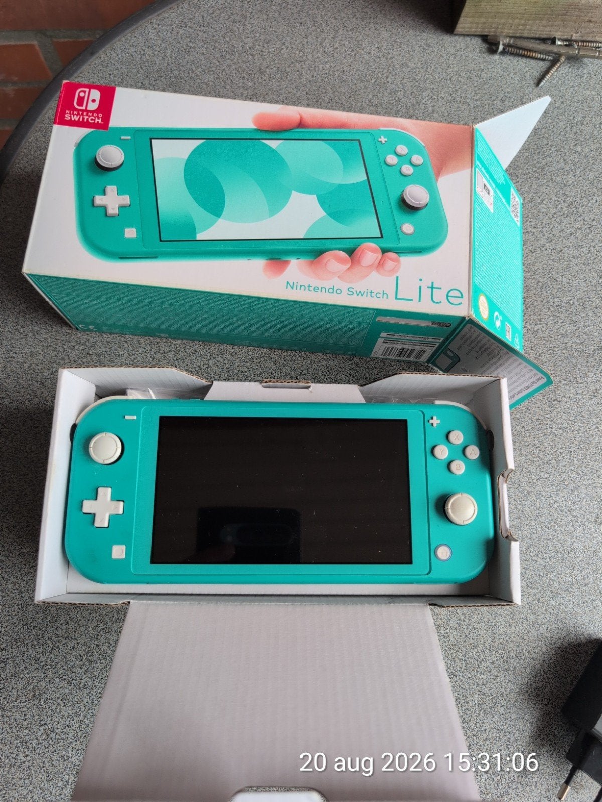 Nintendo Switch Lite, Ophalen of Verzenden, Turquoise, Gebruikt, Met beschermhoes of tas