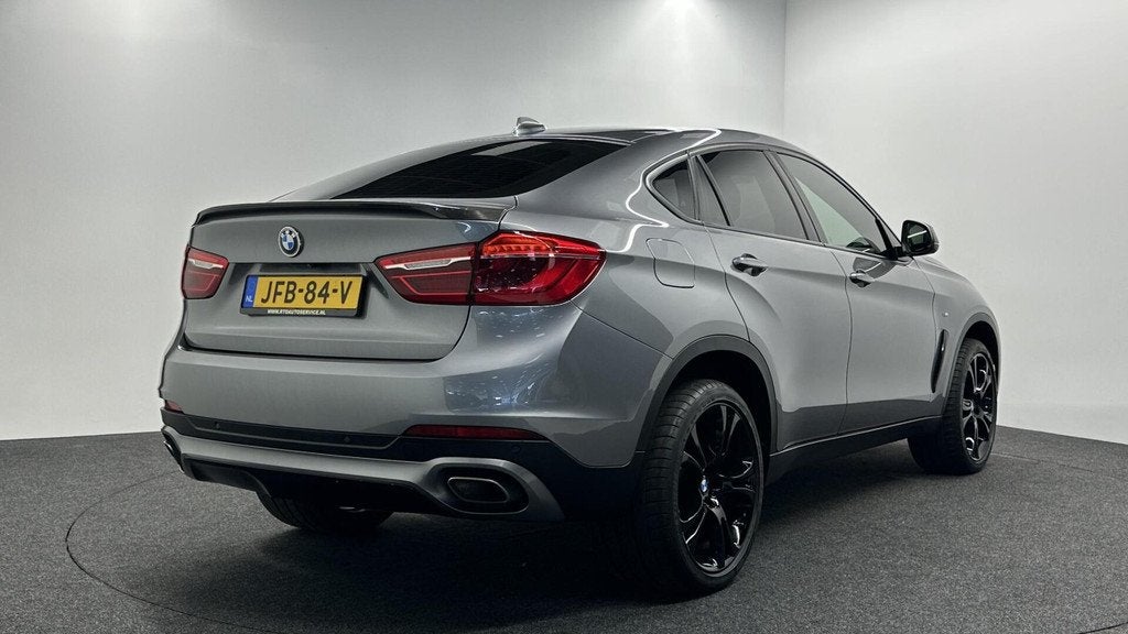 BMW X6 xDrive40d High Executive LEER NAVI CAMERA SCHUIF/OPEN, Auto's, BMW, Gebruikt, 2993 cc, Met garantie (alle), 4 stoelen