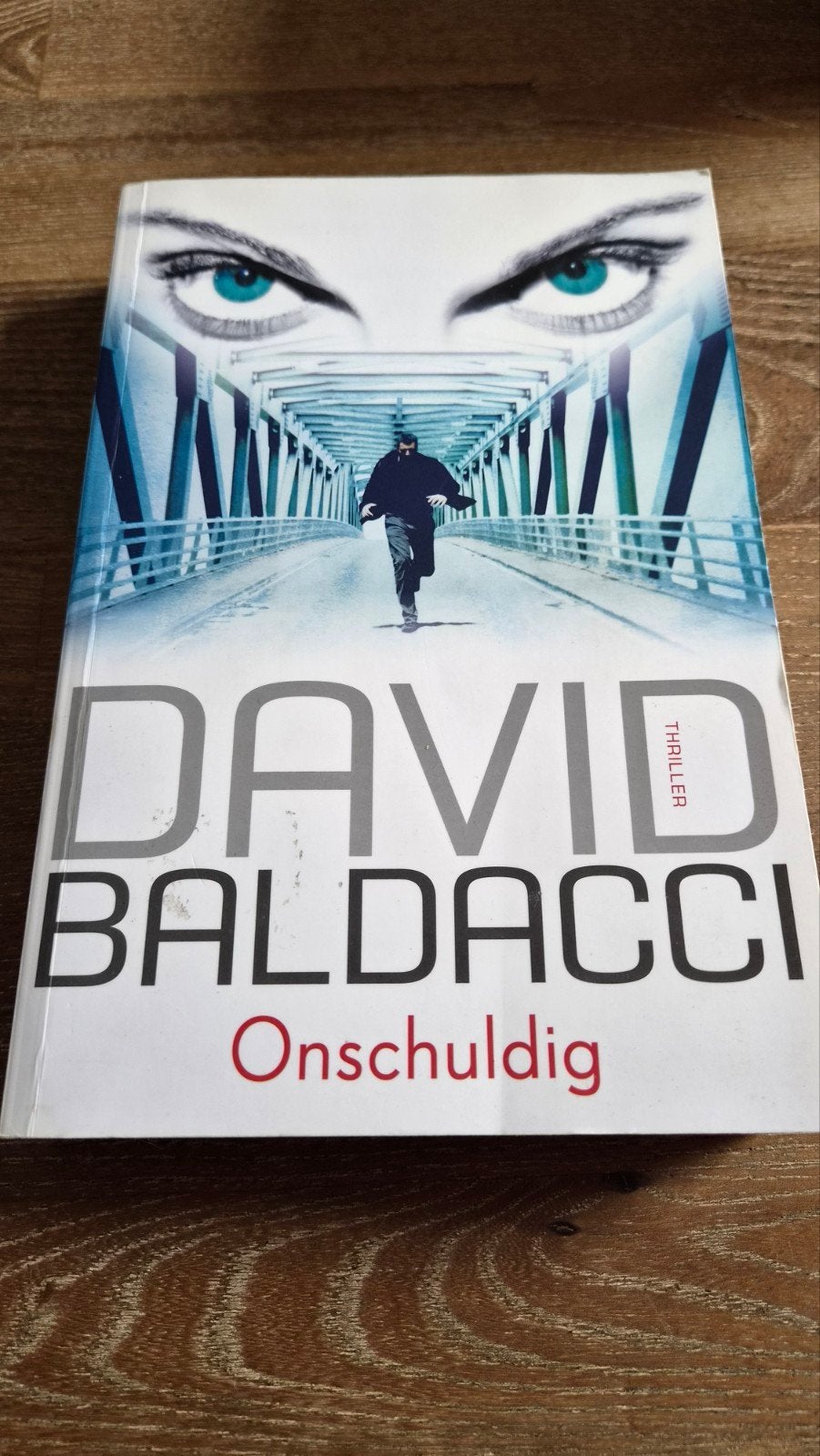 David Baldacci - onschuldig, Ophalen of Verzenden, Gelezen