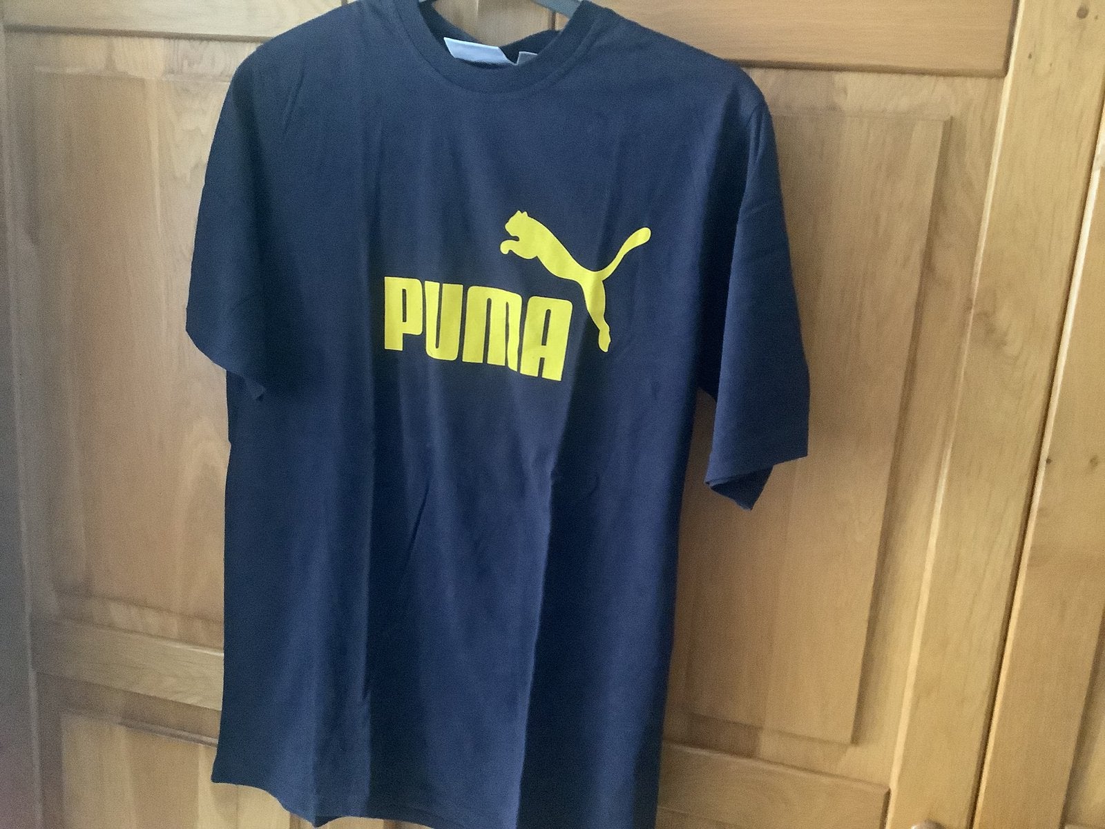 Nieuw donkerblauw shirt van PUMA maat L., Ophalen of Verzenden, Nieuw, Maat 52/54 (L), Blauw