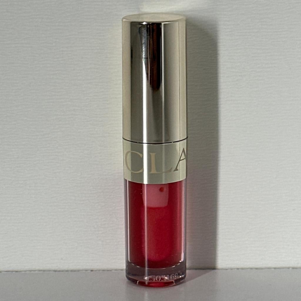 Clarins Lip Comfort Oil Mini #02 Raspberry#, Ophalen of Verzenden, Nieuw, Lippen, Make-up