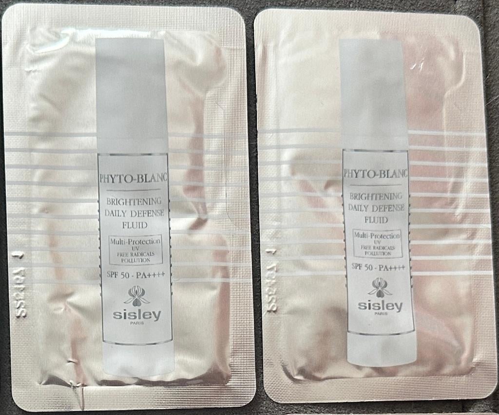2 Sisley Phyto-Blanc testers Brightening Daily Defense Fluid, Ophalen of Verzenden, Nieuw, Gehele gezicht, Verzorging