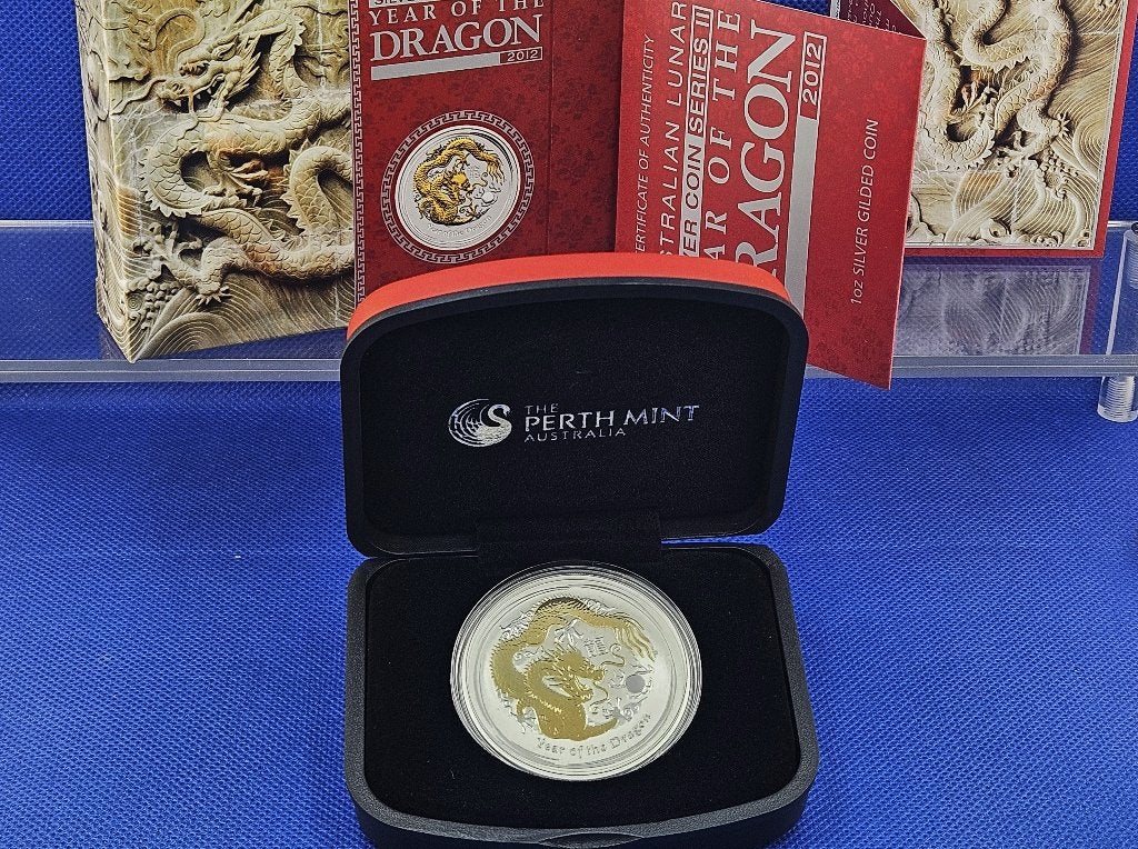 (10720) AUSTRALIA LUNAR II DRAGON GILDED 2012 ONE OUNCE, Ophalen of Verzenden, Setje, Zilver