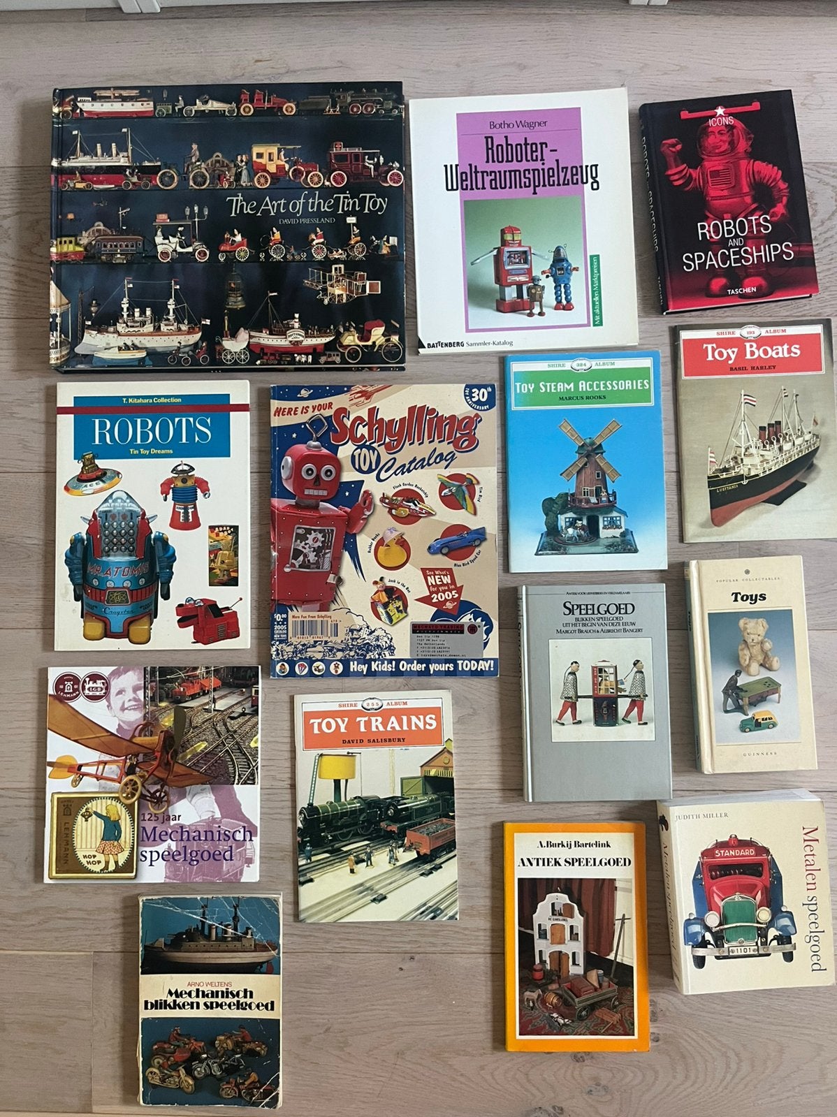 14 boeken blikken speelgoed, robots, tin toys & mechanisch, Verzenden