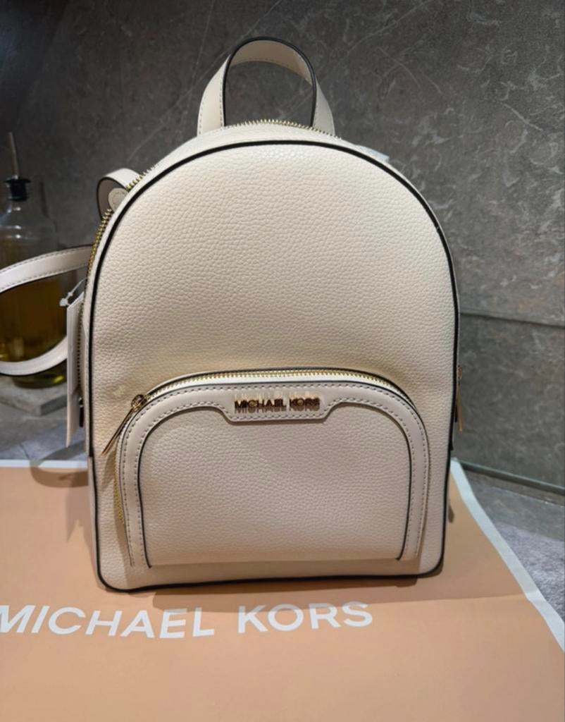 MK Cream rugzak - Nieuw met shopping bag, Sieraden, Tassen en Uiterlijk, Tassen | Rugtassen, Overige merken, Minder dan 30 cm