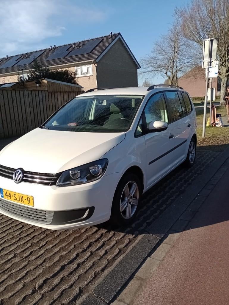 Volkswagen Touran 1.2 TSI 77KW BMT 7P 2011 Wit, Auto's, Voorwielaandrijving, 4 cilinders, 7 stoelen, Wit