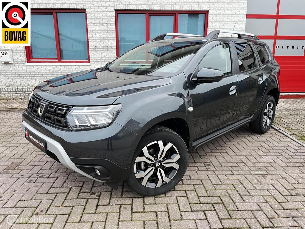 Dacia Duster 1.3 TCe AUTOMAAT/CAMERA/NAVI/CRUISE, Auto's, Dacia, Stof, Gebruikt, Zwart, 4 cilinders