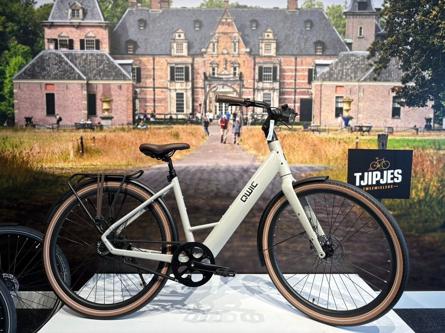 QWIC Signal Dames E-bike Geel | M/L | Nieuw €2.399