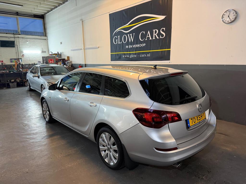 Opel Astra Sports Tourer 1.4 Turbo Cosmo AIRCO|NAVI|TREKHAAK, Euro 5, Stof, Gebruikt, Zwart
