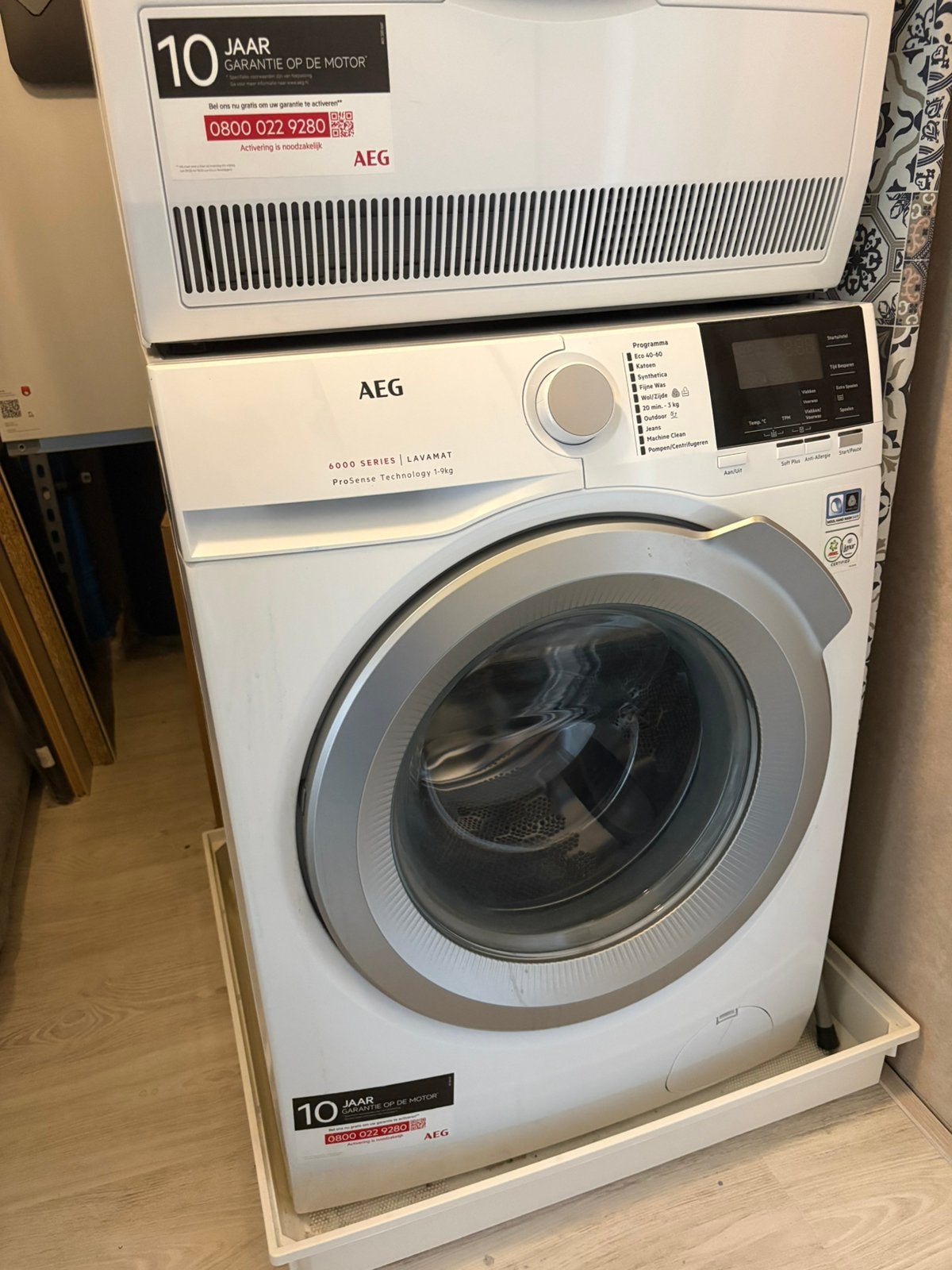 Wasmachine AEG L6FBBerlin prosense 6000 series, Ophalen, Zo goed als nieuw, Voorlader, 85 tot 90 cm